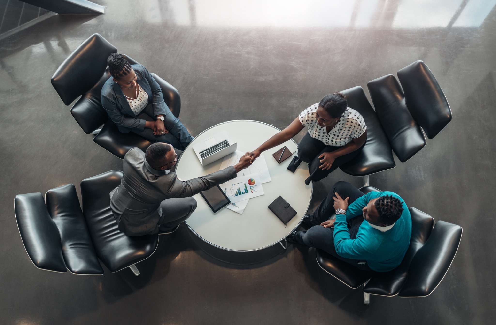 Executive team collaborating around a conference table